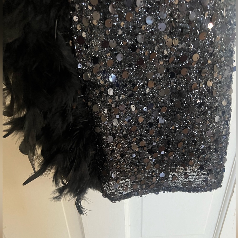 Black Sequins Gown With Feather Trim. - image 5
